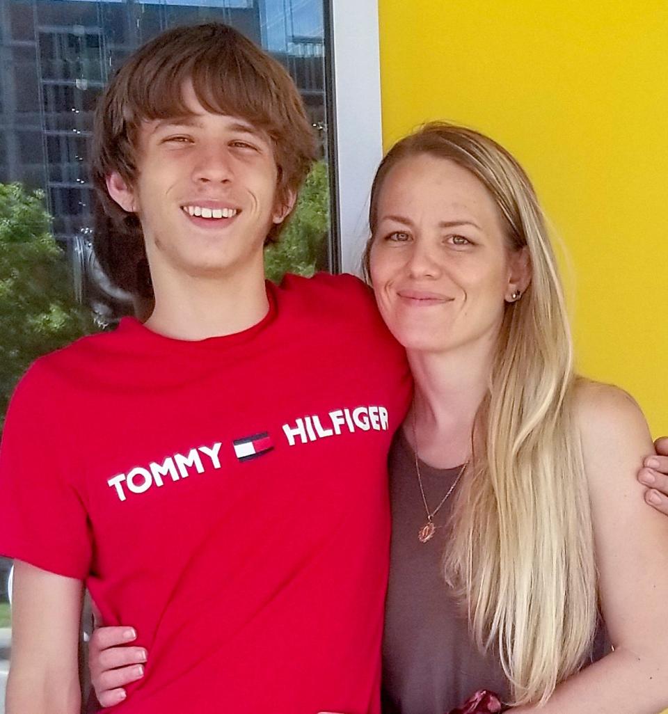 Stavian Rodriguez is pictured with his mother, Cameo Holland. Charges have been dropped against five Oklahoma City police officers in the fatal shooting of Rodriguez.