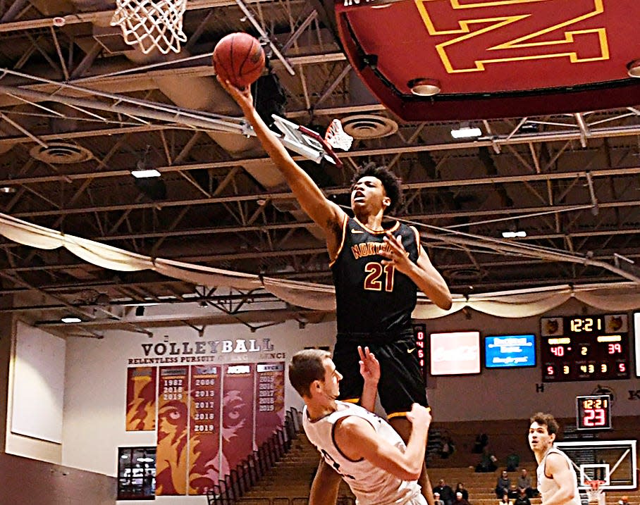 Jacksen Moni, a 6-foot-10 junior forward from Fargo (N.D.) is a player to watch for the 2023-24 Northern State University men's basketball team.