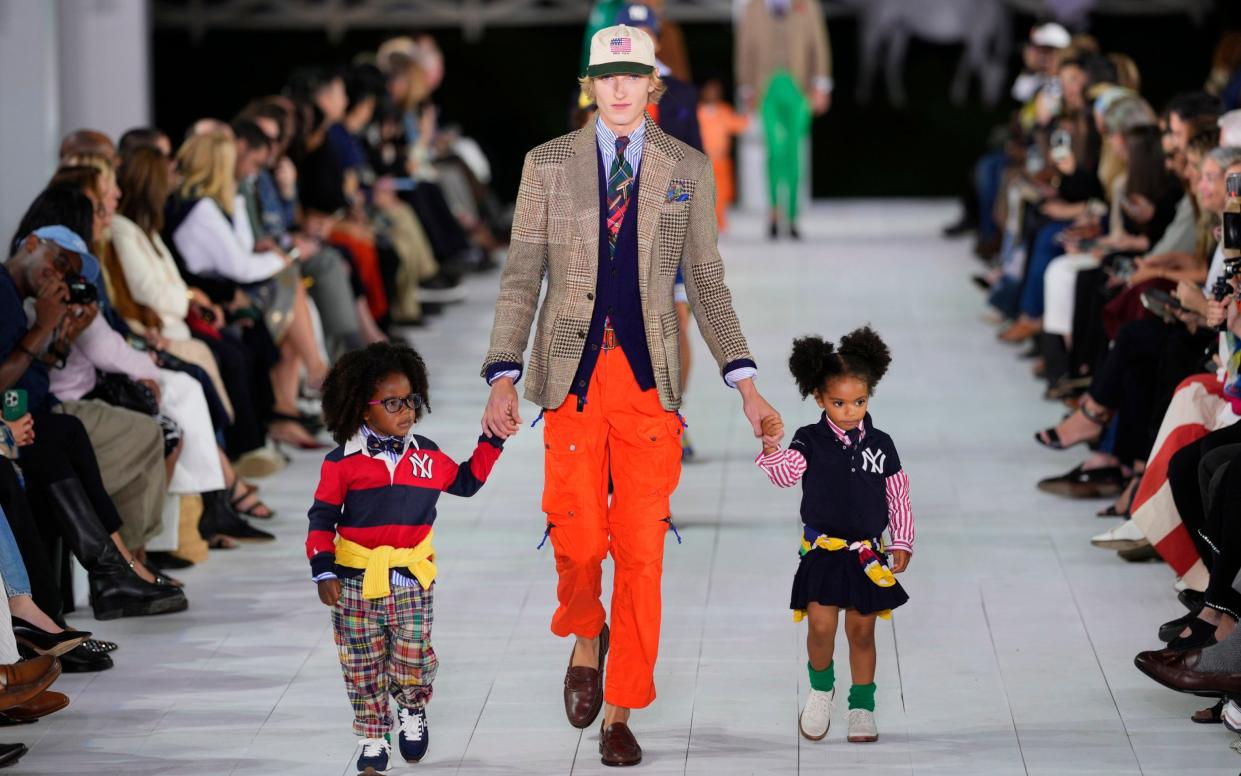 Tweed jackets were paired with primary-coloured trousers