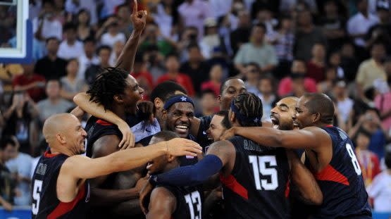 (HR) ABOVE: Team USA celebrate their narrow win over Spain. The U.S. men's basketball team won the gold medal at the Beijing 2008 Olympic Games with a 118-107 victory over Spain Sunday afternoon at the Olympic Basketball Gymnasium. Spain had closed to wit