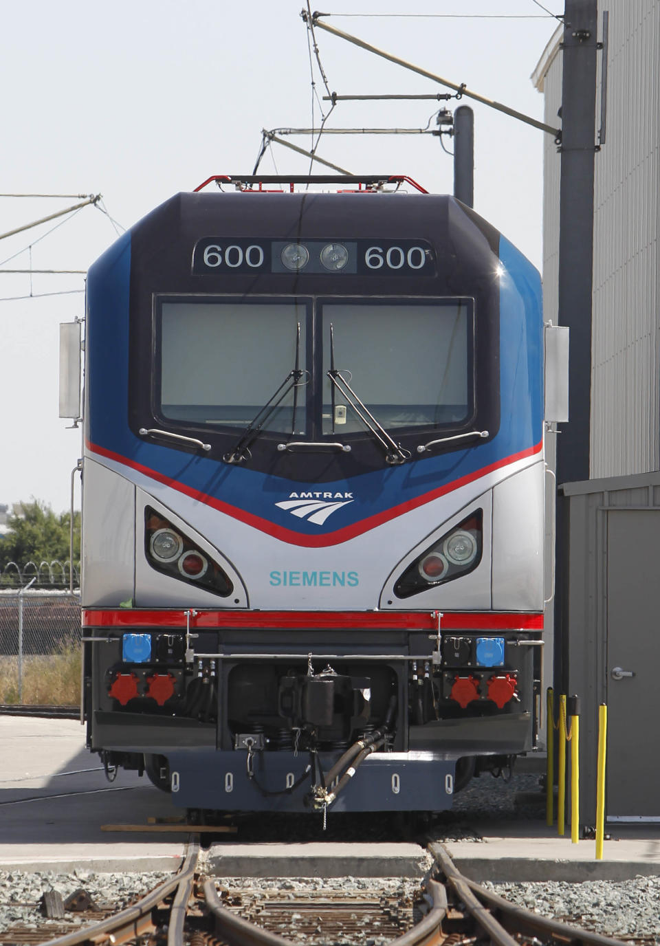 In this photo taken Saturday, May 11, 2013, is one of the new Amtrak Cities Sprinter Locomotives built by Siemens Rails Systems in Sacramento, Calif. The new electric locomotive, one of three of 70 to be built, will run on the Northeast intercity rail lines and replace Amtrak locomotives that have been in service for 20 to 30 years.(AP Photo/Rich Pedroncelli)