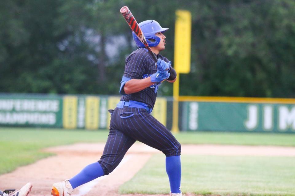 Perry's Juan Hernandez gets a hit during the Class 3A Substate 7 baseball quarterfinals on Friday, July 7, 2023, in Saydel.