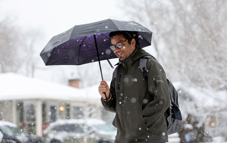 Nilendu Das walks during a snowstorm in Salt Lake City on Thursday, Jan. 11, 2024. | Kristin Murphy, Deseret News