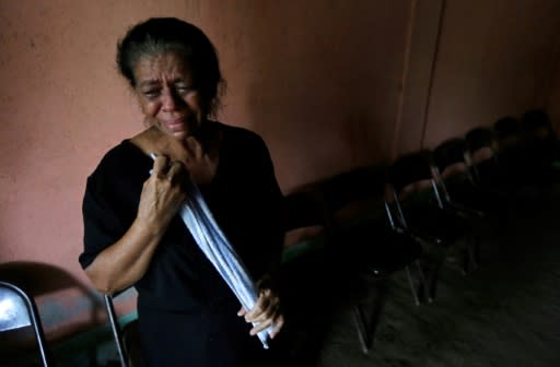 The mother a victim shot dead during recent protests against the government of President Daniel Ortega, shown here at her son's wake in the city of Sebaco