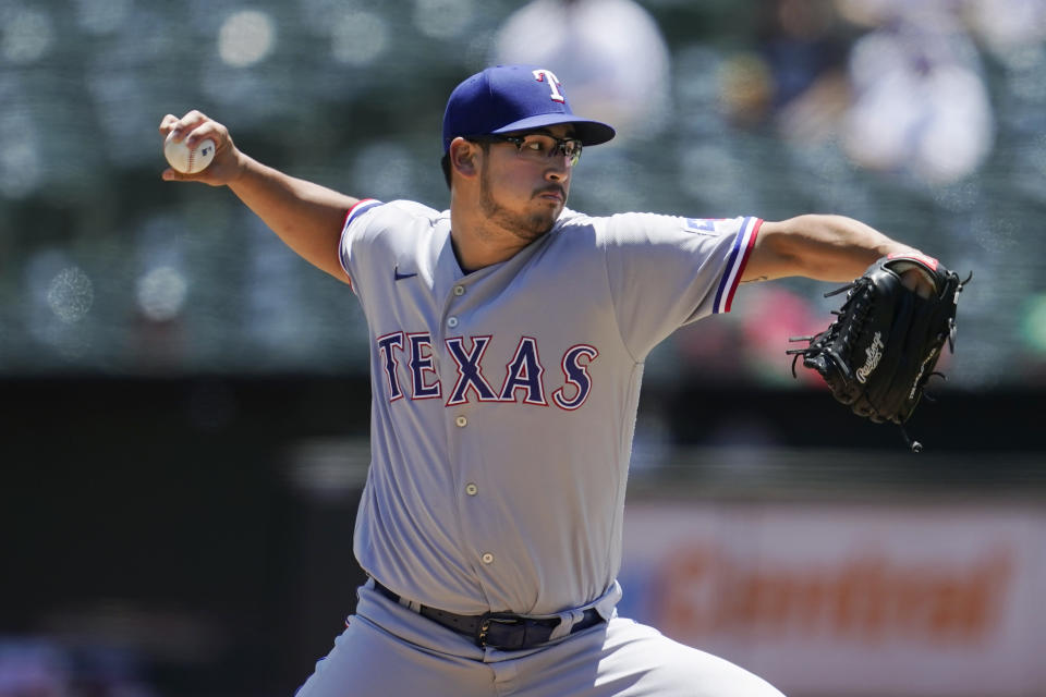 Texas Rangers' Dane Dunning pitches against the Oakland Athletics during the first inning of a baseball game in Oakland, Calif., Thursday, July 1, 2021. (AP Photo/Jeff Chiu)
