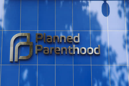 FILE PHOTO: A sign is pictured at the entrance to a Planned Parenthood building in New York August 31, 2015. Picture taken August 31, 2015. REUTERS/Lucas Jackson/File Photo