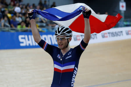 Cycling - UCI Track World Championships - Men's Omnium, Points Race - Hong Kong, China – 15/4/17 - France's Benjamin Thomas celebrates after winning gold. REUTERS/Bobby Yip