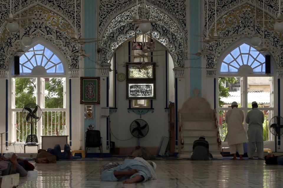 The heatwave has coincided with the holy month of Ramadan, when most Muslims do not eat or drink during daylight hours (EPA)