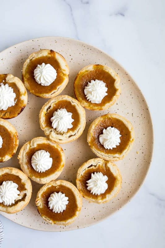 <p>Dessert For Two</p><p>Mini pumpkin pies for a small Thanksgiving celebration, made in a muffin pan. </p><p><strong>Get the recipe: <em><a href="https://www.dessertfortwo.com/mini-pumpkin-pies/" rel="nofollow noopener" target="_blank" data-ylk="slk:Homemade Mini Pumpkin Pies;elm:context_link;itc:0;sec:content-canvas" class="link ">Homemade Mini Pumpkin Pies</a></em></strong></p><p><strong>Related: <a href="https://parade.com/844509/felicialim/28-sweet-pumpkin-desserts-to-make-this-fall/" rel="nofollow noopener" target="_blank" data-ylk="slk:28 Sweet Pumpkin Desserts to Make This Fall;elm:context_link;itc:0;sec:content-canvas" class="link ">28 Sweet Pumpkin Desserts to Make This Fall</a></strong></p>