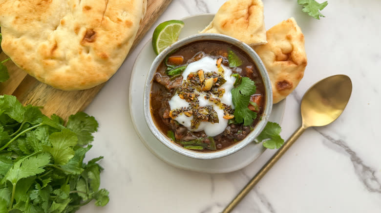 bowl of soup with naan