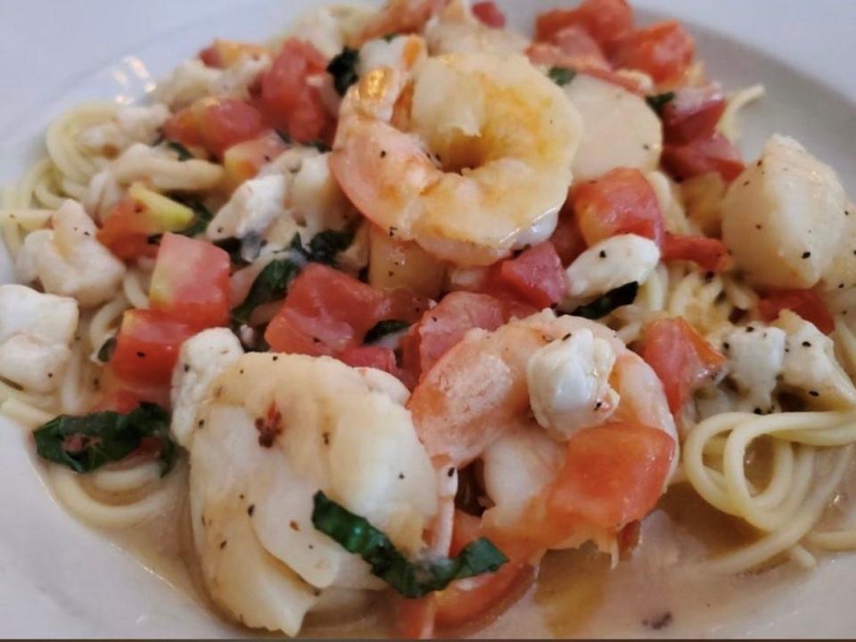 A menu favorite at Cucina Carini in Mount Laurel is Trio Di Mare,  a three-seafood dish of shrimp, scallops and crab  scallops &  sautéed with plum tomatoes in a white wine basil sauce. The Italian restaurant will offer specials for the expanded Burlington County Restaurant Week in early  March and late August 2023.