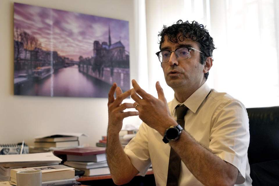 Notary Joseph Bechara who conducted scores of civil marriages in Lebanon speaks during an interview with The Associated Press in Beirut, Lebanon, Thursday, June 2, 2022. In Lebanon, the question of civil marriage is a contentious issue mired in fierce religious and political debates. (AP Photo/Bilal Hussein)