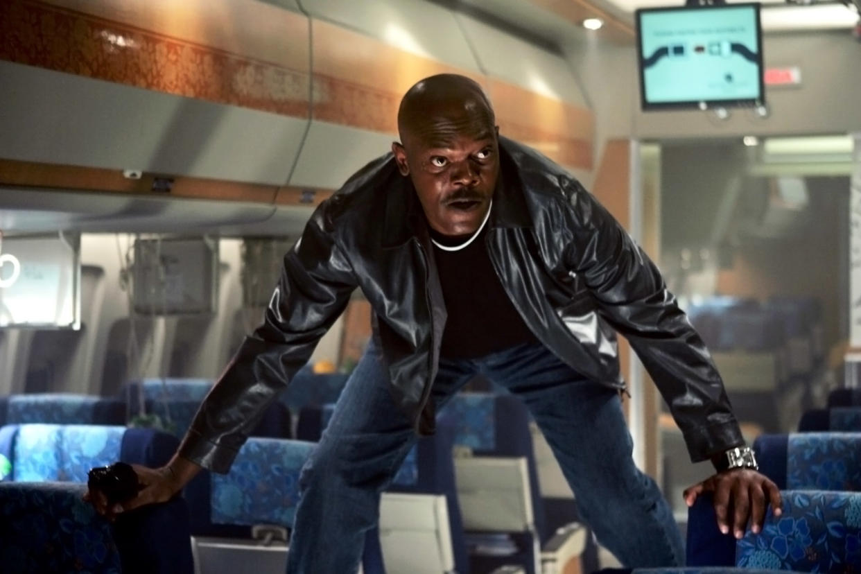 Samuel L. Jackson avoids reptile danger in 'Snakes on a Plane' (Photo: New Line Cinema / Courtesy: Everett Collection)