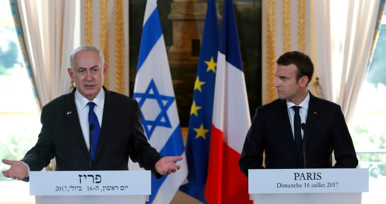 French President Emmanuel Macron called for a resumption of Middle East peace talks when he met Israeli Prime Minister Benjamin Netanyahu in Paris