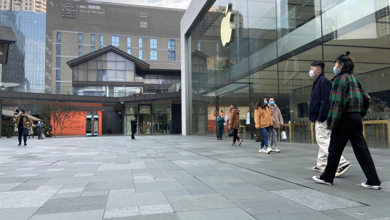 Chengdu/China-Feb.2020: New type coronavirus pneumonia in Wuhan has been spreading into many cities in China. Wearing masks, few people playing the Chunxi Road in Chengdu,China,which is Chengdu's most famous shopping street and has numerous stores for shopping.