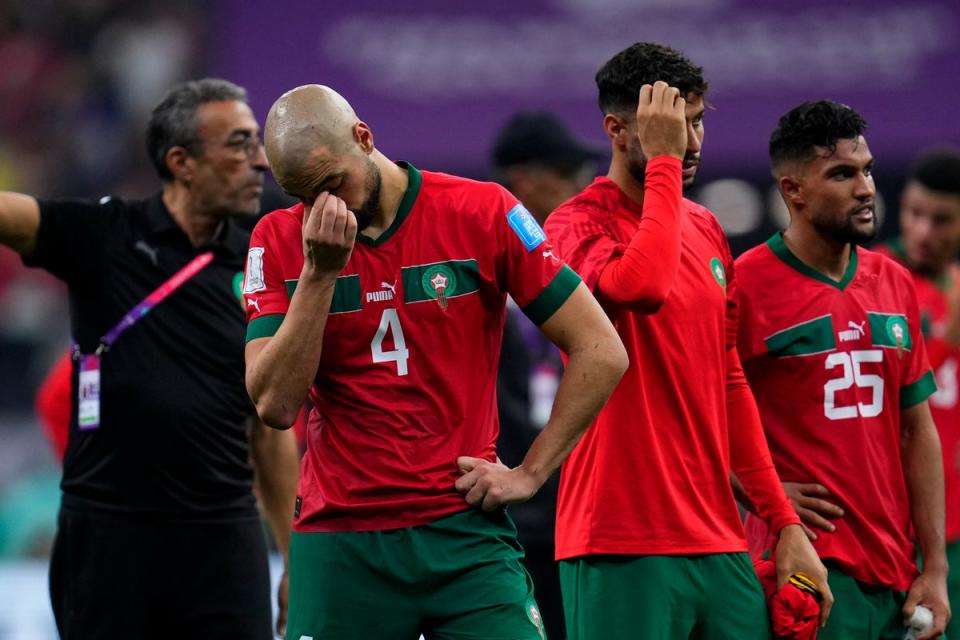 Morocco’s Sofyan Amrabat looks down after being defeated by France (AP)