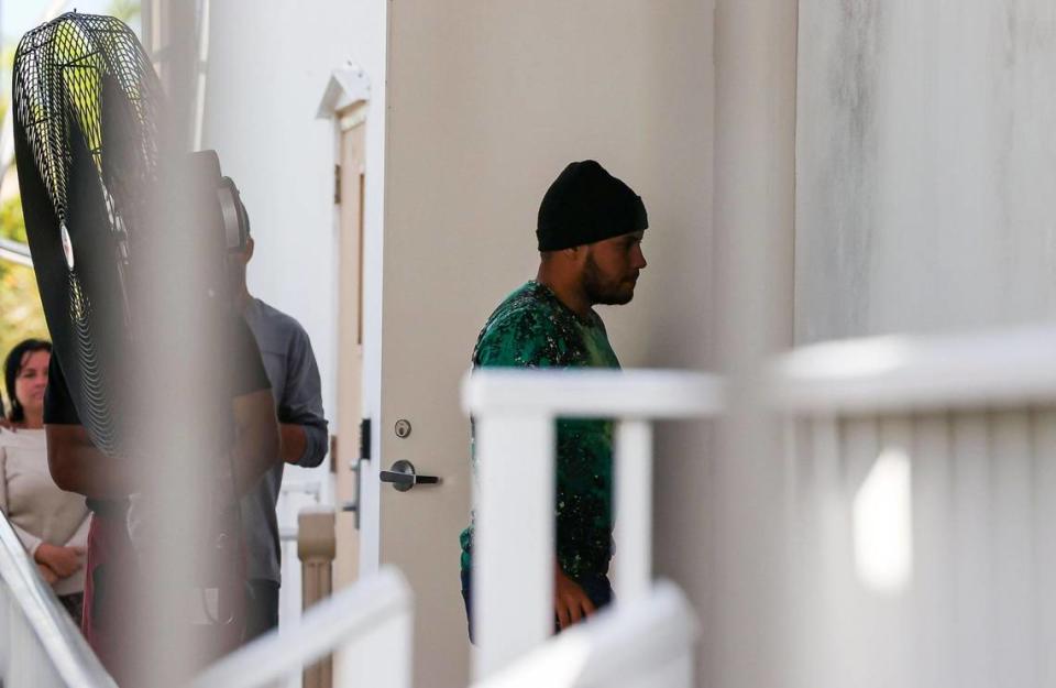 A group of Cuban migrants enter the U.S. Customs and Border Protection office on Sunday, Jan. 8, 2023, in Marathon, Fla.