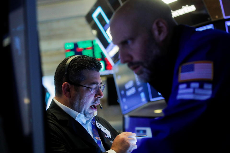 Traders work on the floor of the New York Stock Exchange (NYSE) in New York City, U.S., September 29, 2021. REUTERS/Brendan McDermid