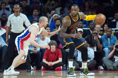 Apr 22, 2016; Auburn Hills, MI, USA; Cleveland Cavaliers forward LeBron James (23) backs down Detroit Pistons guard Steve Blake (22) during the fourth quarter in game three of the first round of the NBA Playoffs at The Palace of Auburn Hills. Mandatory Credit: Tim Fuller-USA TODAY Sports