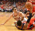 Washington Wizards guard Bradley Beal (3) wins a scramble for the ball with Chicago Bulls guard Kirk Hinrich (12) during Game 2 in an opening-round NBA basketball playoff series Tuesday, April 22, 2014, in Chicago. The Wizards won 101-99. (AP Photo/Daily Herald, Rick West)