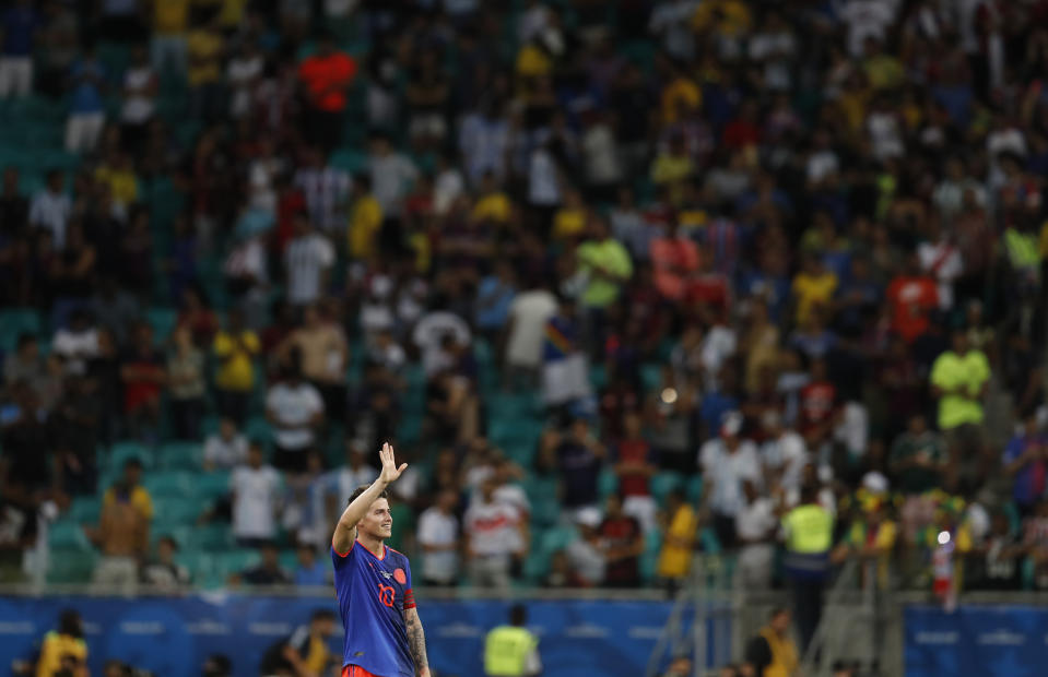 Colombia's James Rodriguez greets fans at the end of the Copa America Group B soccer match against Argentina at the Arena Fonte Nova in Salvador, Brazil, Saturday, June 15, 2019. (AP Photo/Natacha Pisarenko)