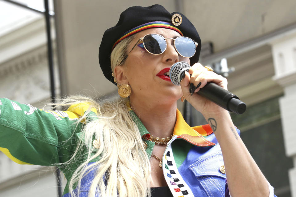 FILE - This June 28, 2019 file photo shows Lady Gaga performing in the second annual Stonewall Day honoring the 50th anniversary of the Stonewall riots, hosted by Pride Live and iHeartMedia in New York. Officials say Lady Gaga’s dog walker was shot and her two French bulldogs stolen in Hollywood during an armed robbery. Los Angeles police are seeking two suspects, thought it’s not known if both were armed, in connection with the Wednesday night shooting. (Photo by Greg Allen/Invision/AP, File)