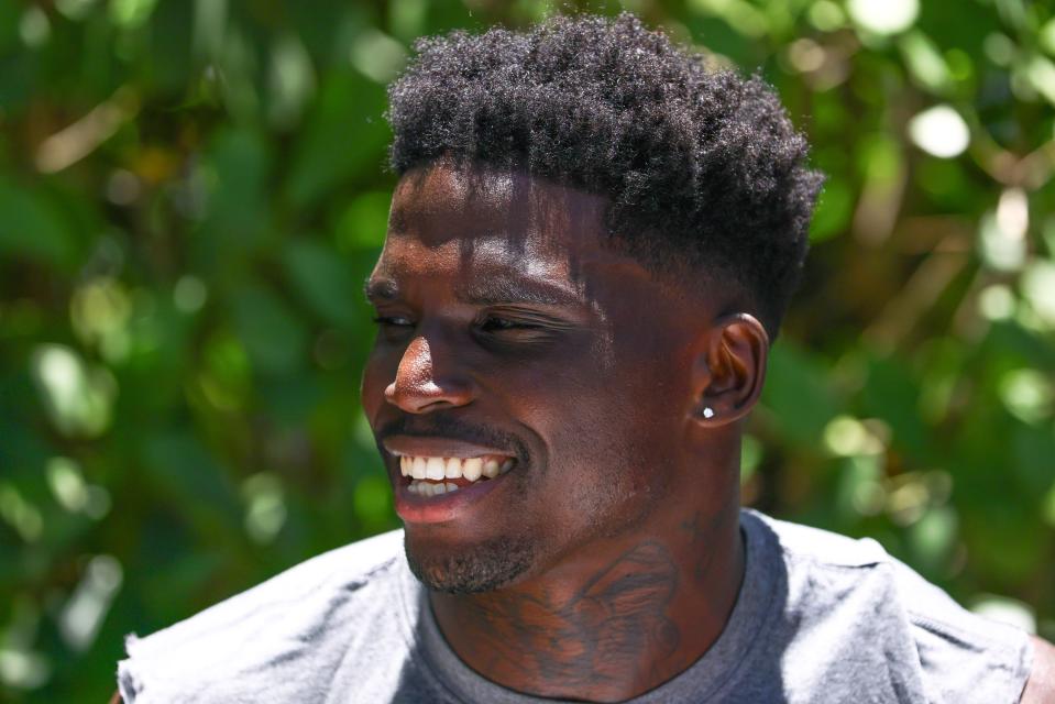 Jun 4, 2024; Miami Gardens, FL, USA; Miami Dolphins wide receiver Tyreek Hill (10) speaks to reporters during mandatory minicamp at Baptist Health Training Complex. Mandatory Credit: Sam Navarro-USA TODAY Sports