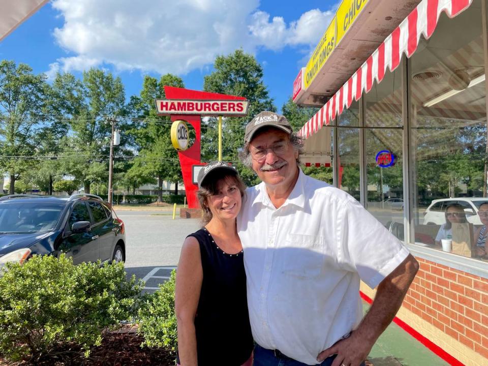 George and Elaine Demopoulos, shown here on June 23, 2021, made the decision to close Zack’s Hamburgers after 46 years.