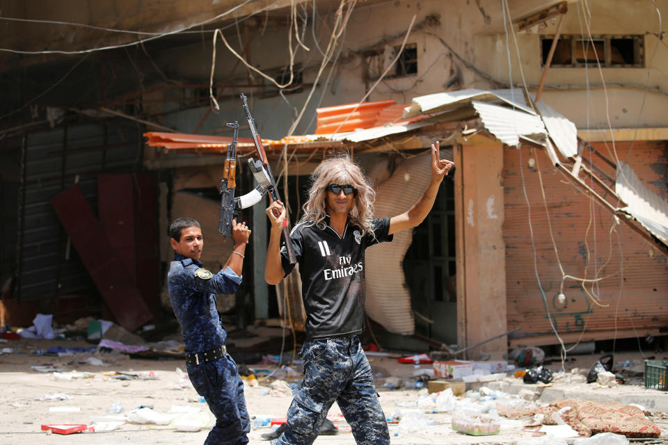 Iraqi soldiers celebrate in Fallujah