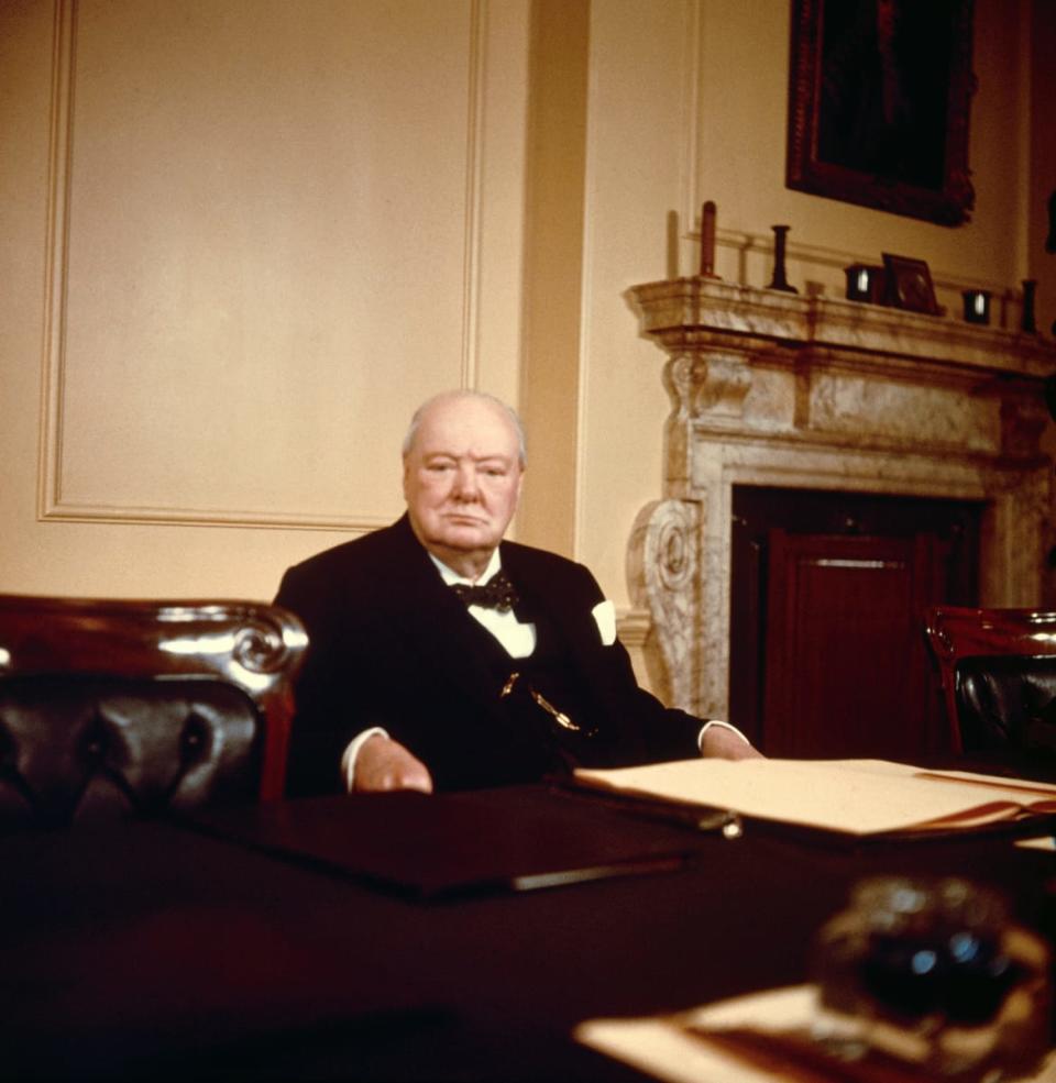 <div class="inline-image__caption"><p>Sir Winston Churchill, Britain's Prime Minister, seated at his desk on his 80th birthday.</p></div> <div class="inline-image__credit">Bettmann/Getty</div>