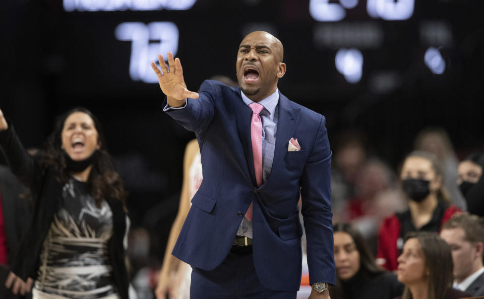 FILE - Nebraska associate head coach Chuck Love speaks to players from the sideline as they play against Michigan during the second half of an NCAA college basketball game Tuesday, Jan. 4, 2022, in Lincoln, Neb. A former Nebraska women's basketball player alleges coach Amy Williams and athletic director Trev Alberts did not take appropriate action when her sexual relationship with an assistant coach became widely known. Ashley Scoggin filed a civil lawsuit on Sunday, Feb. 18, 2024, in U.S. District Court describing how Love allegedly took a special interest in her and how the relationship turned sexual and caused Scoggin to fear retaliation if she refused to engage in it. (AP Photo/Rebecca S. Gratz, File)