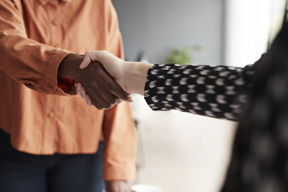 Two people shaking hands