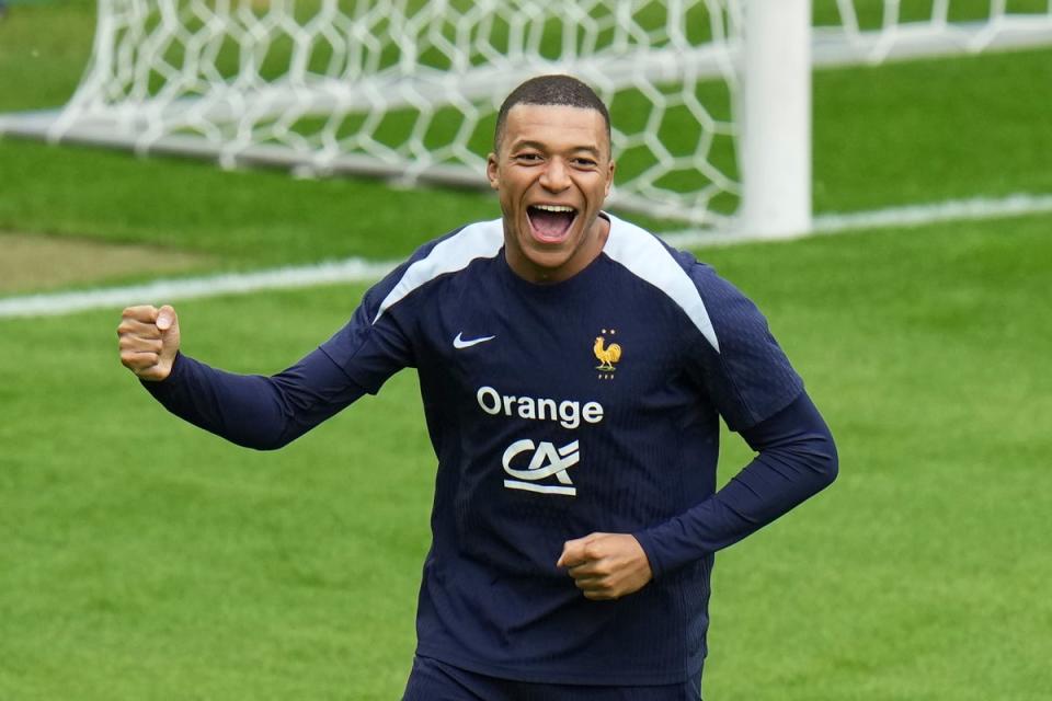 France's Kylian Mbappe gestures during training in Paderborn (AP)