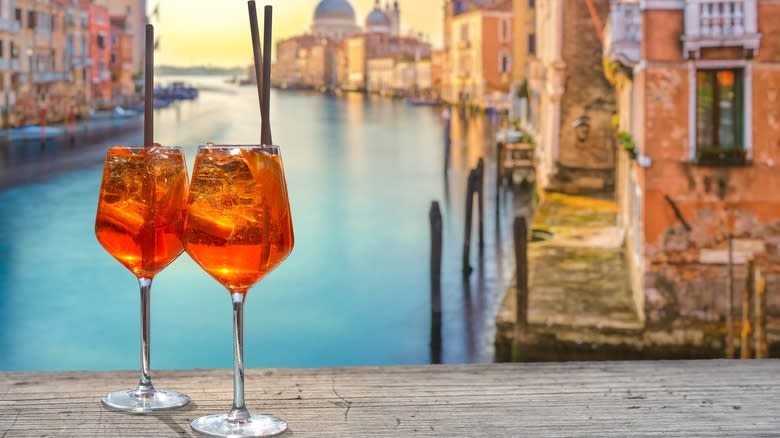 Aperol Spritz glasses with Venice in background