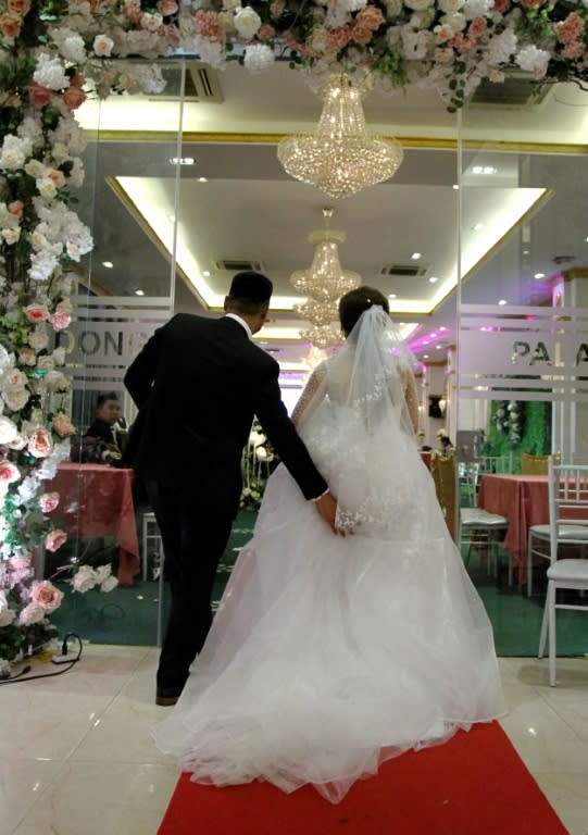 The wedding-guests-for-hire business is growing in Vietnam -- where some 70 percent of people over 15 are married -- and not just among pregnant women like Kha looking for stand-in husbands