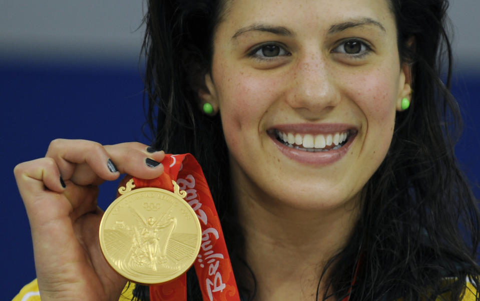 In a file picture taken on August 10, 2008 Australia's Stephanie Rice holds her medal after the women's 400m individual medley swimming final at the National Aquatics Center during the 2008 Beijing Olympic Games in Beijing. (TIMOTHY CLARY/AFP/Getty Images)
