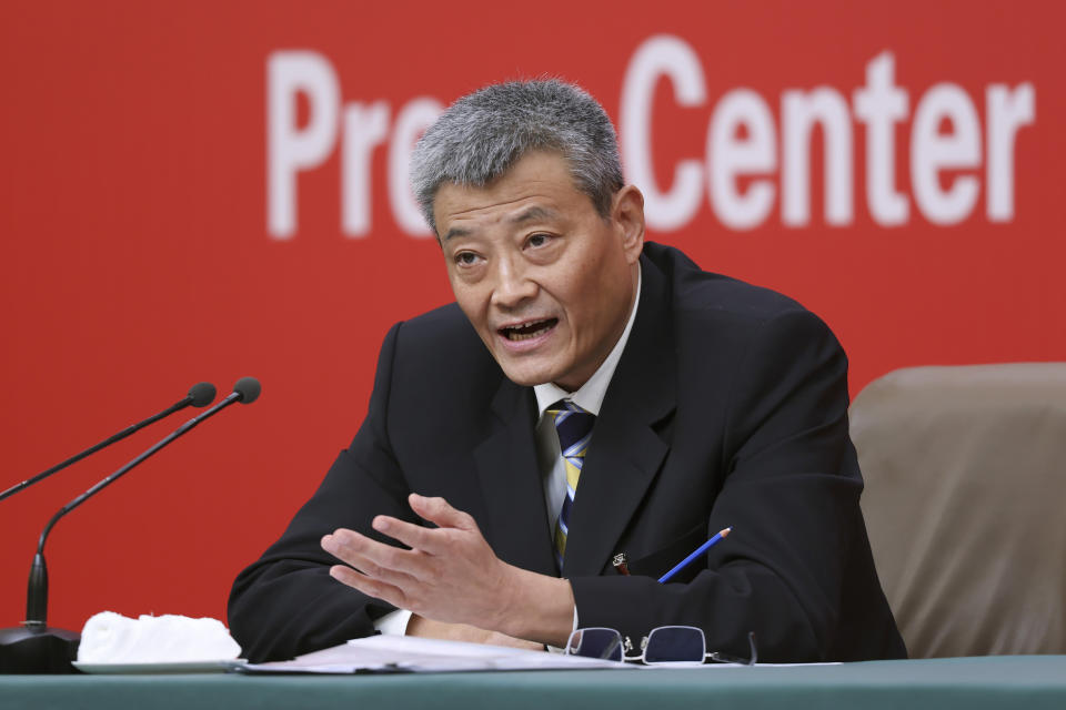 In this photo released by Xinhua News Agency, deputy secretary of the party's Committee for Discipline and Inspection Xiao Pei speaks at a press conference on the sidelines of the ongoing 20th Chinese Communist Party's National Congress in Beijing, Oct. 17, 2022. China's ruling Communist Party says it has probed almost 5 million members for possible corruption over the last decade, with formal criminal cases brought against 553. (Chen Jianli/Xinhua via AP)