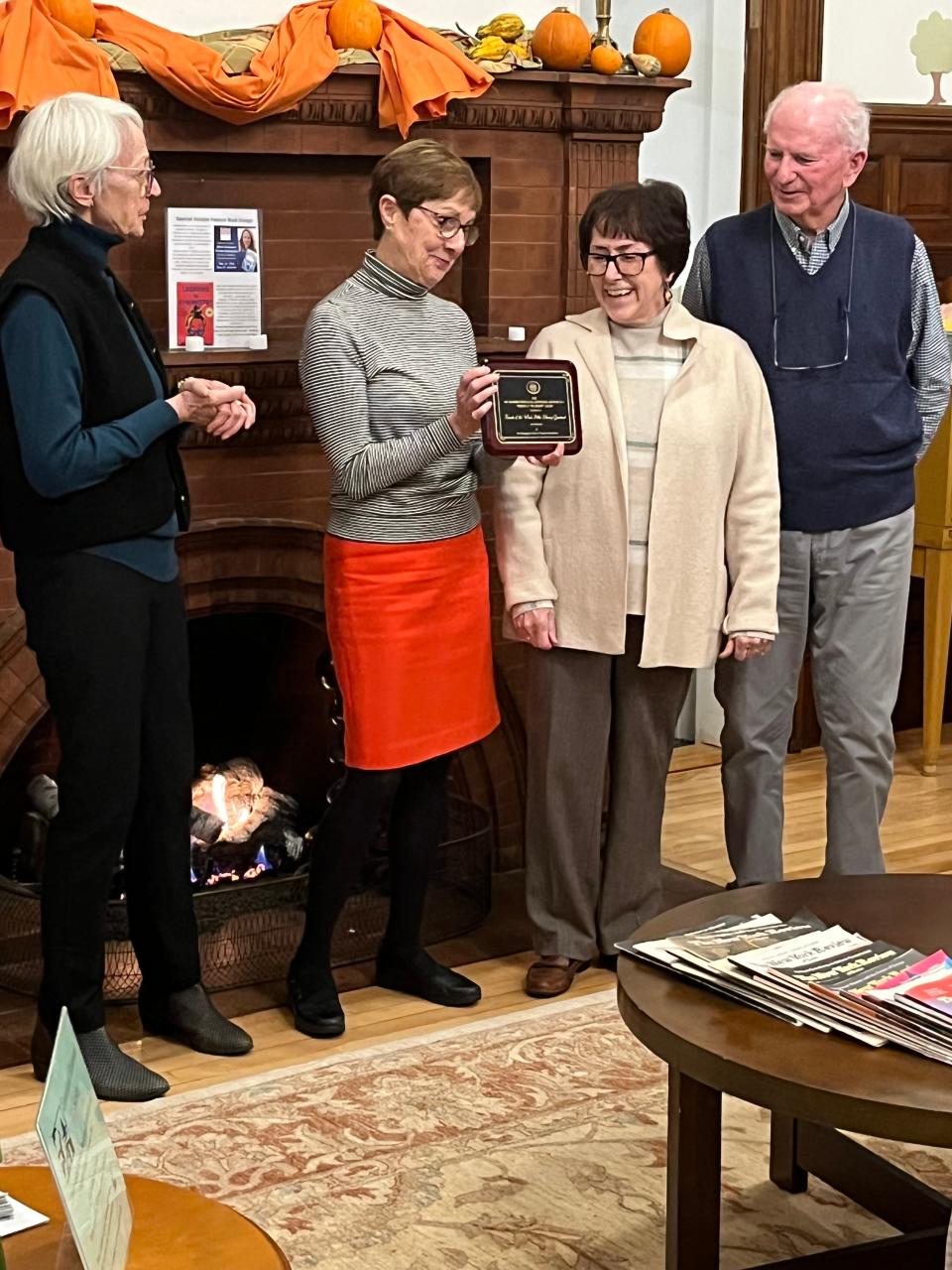 On Nov. 17, 2022 Katrinka Pellecchia of the New Hampshire Library Trustee Association presented the Friends of the Weeks Library with the 2022 Sue Palmatier Award for Friends group of the year. Friends Stuart Bauder, Debra Miesfeldt and Phyllis Picha accepted the award.