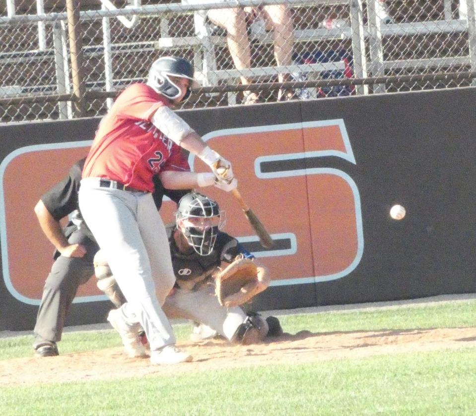 Licking County Settlers' Drew Firchau, a Granville graduate, hits against the Xenia Scouts during Great Lakes Summer Collegiate League play at Heath's Dave Klontz Field on Friday, June 24, 2022. Firchau had an RBI double, but the Settlers fell to the visiting Scouts 9-1.