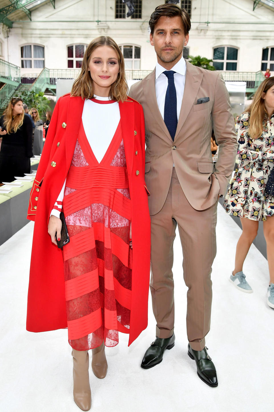 <p><strong>1 October </strong>Olivia Palermo posed for cameras wile wearing a vibrant red sheer dress over a white body suit.</p>