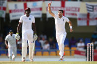 <p>James Anderson of England claims the wicket of Denesh Ramdin to become England’s most successful Test bowler of all time </p>
