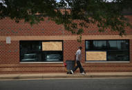 <p>Two windows at the YMCA building broken by bullets are shown boarded up near the Eugene Simpson Stadium Park, the site where House Majority Whip Rep. Steve Scalise was shot by gunman James Hodgkinson, June 19, 2017 in Alexandria, Va. Investigators have concluded their investigation at the shooting scene and the area has been reopened to the public. (Photo: Alex Wong/Getty Images) </p>
