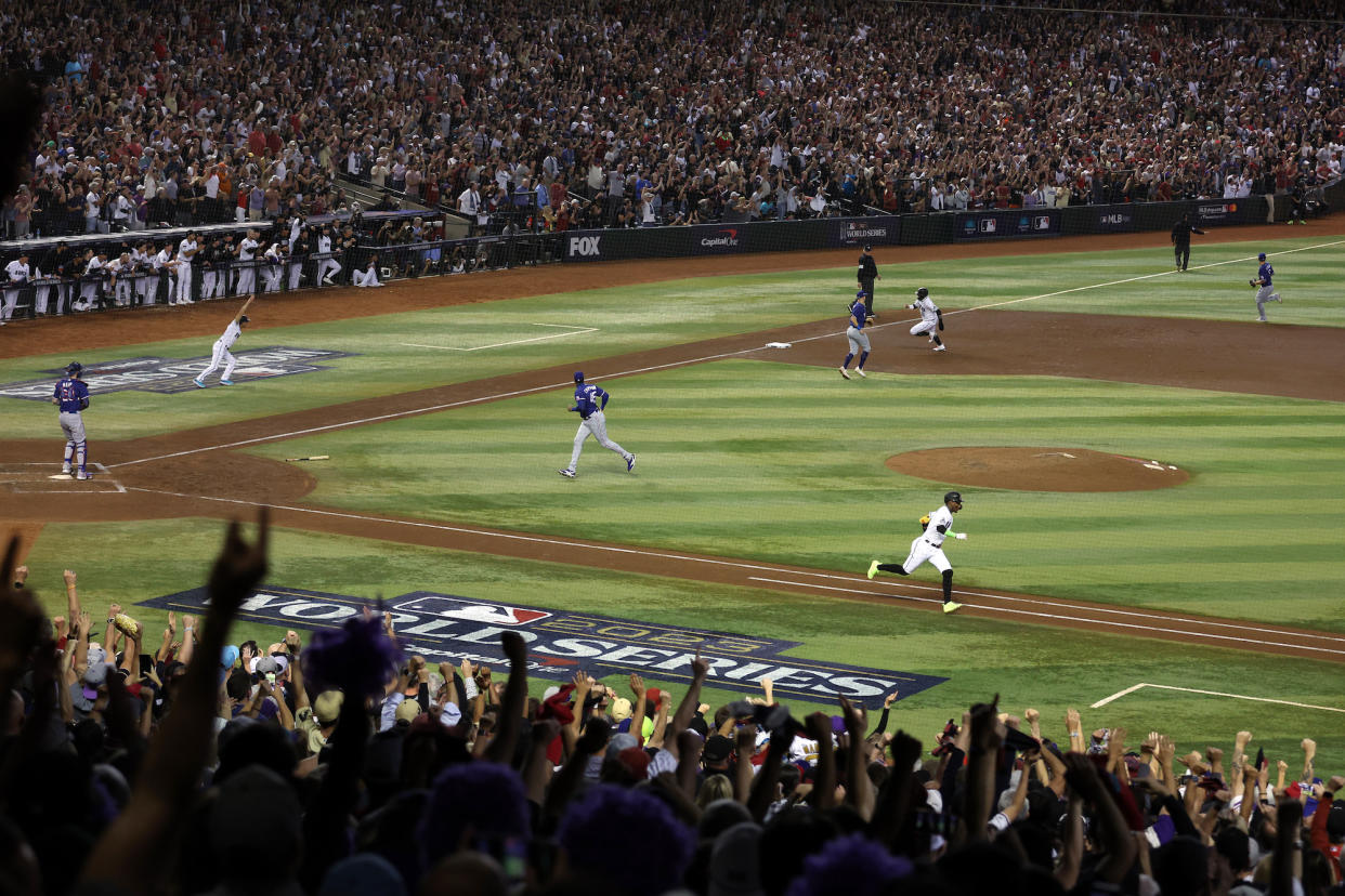 The Diamondbacks score their lone run during Monday's Game 3 loss. (Jamie Squire/Getty Images)