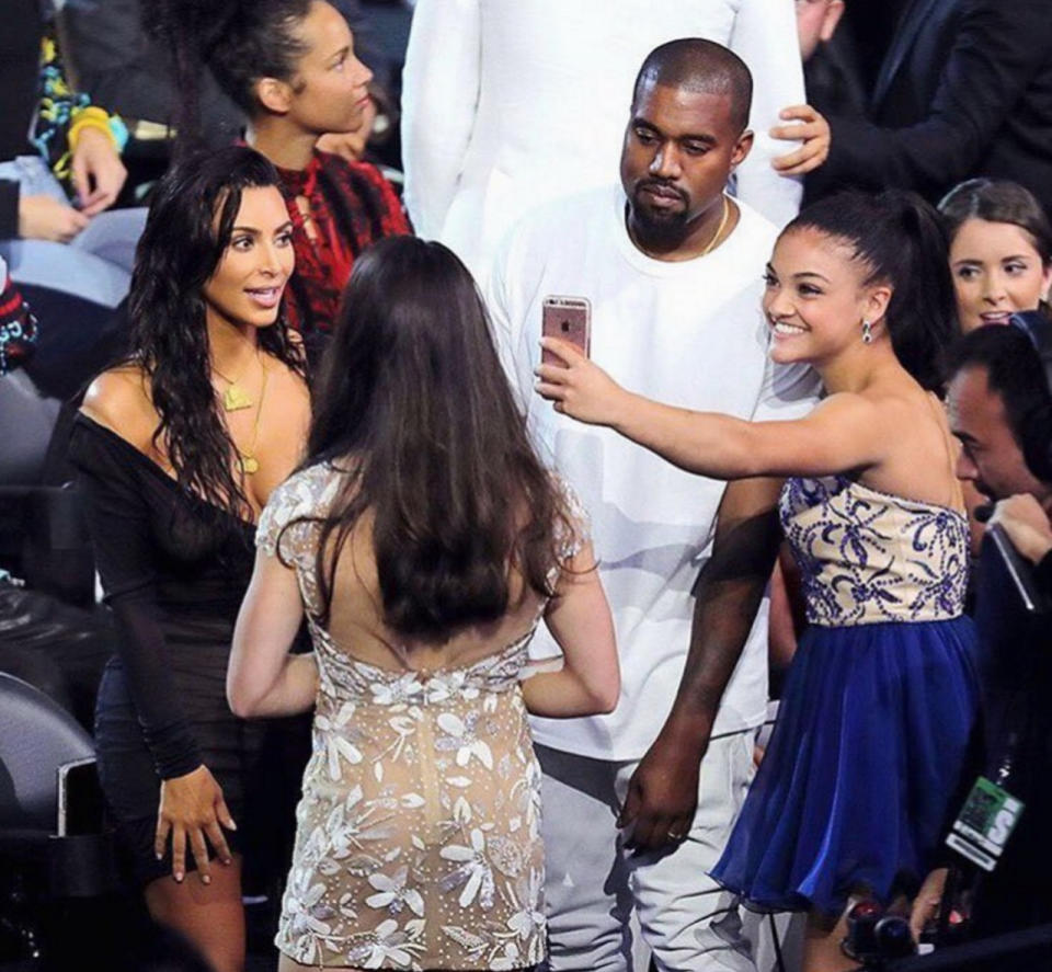 Laurie Hernandez couldn’t help but grab Kanye West for a selfie, joking that she loves Kanye more than he loves Kanye.