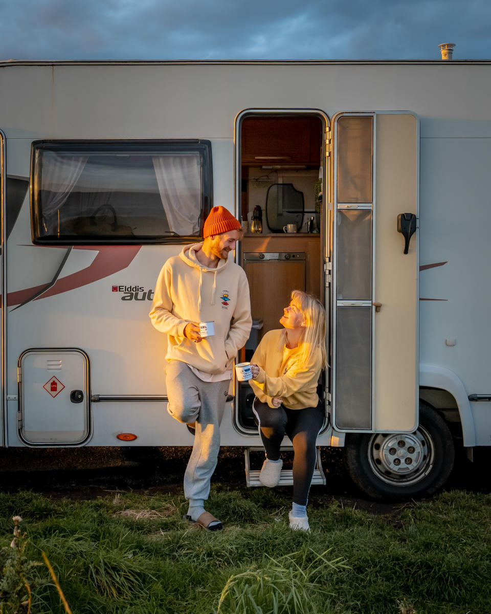 Campbell Kerr, 28 Gemma Spence, 27, outside their motorhome. (@highlands2hammocks/Caters)