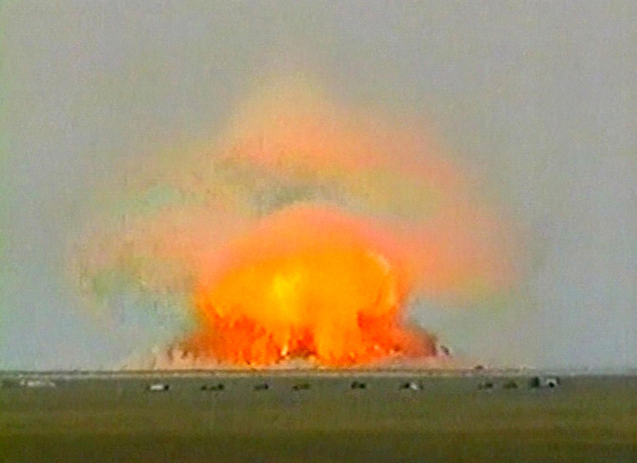 An ordnance explodes in a giant fireball during a test in this image shown by Russian Channel One in 2007.