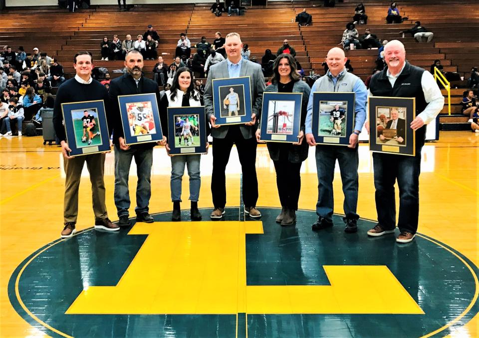 Seven new members were inducted into the Lancaster High School Gary Mauller Wall of Honor. Those inducted were, from left to right: Bryan Bowdish, Billy Burke, Erica Campbell Goss, Greg Cave, Alysha Gossel Curry, Steve Poston and Jack Greathouse.