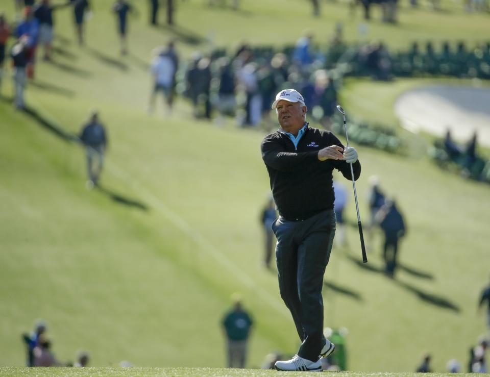 FILE - Mark O'Meara hits on the first hole during the first round at the Masters golf tournament Thursday, April 5, 2018, in Augusta, Ga. O'Meara said he finally got an autograph from Arnold Palmer at the last Masters dinner Palmer attended. (AP Photo/Chris Carlson, File)