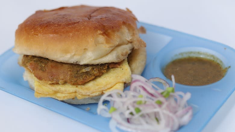 pakistani bun kabab on tray