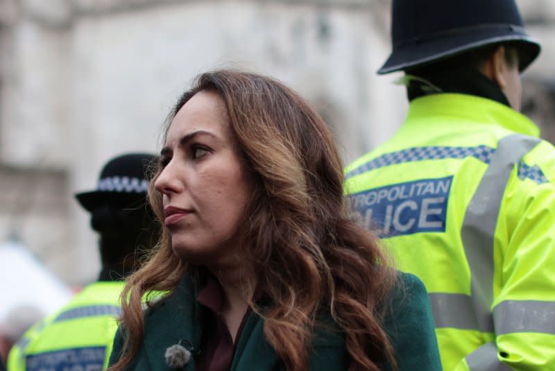 Stella Assange talks to the media about her husband Julian Assange's extradition to the United States. Photo by Hugo Philpott/UPI